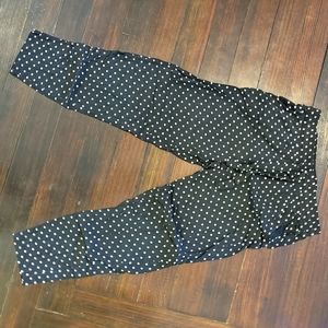 Black pants with white polka dots